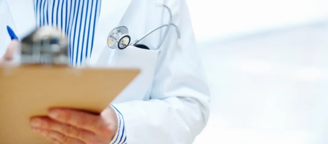 Doctor holding a clipboard