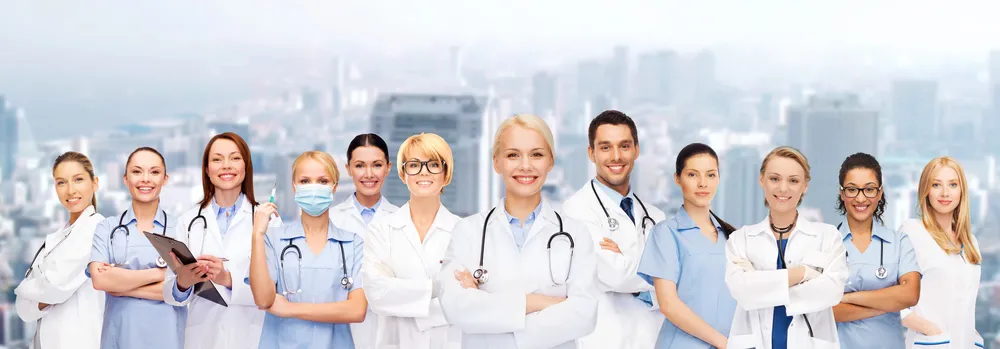 Medical team standing confidently together